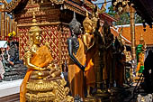 Chiang Mai - Wat Phra That Doi Suthep. The innercourtyard of the temple is filled with Buddha statues and other religious paraphenalia. 